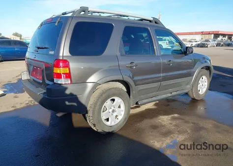 2004 Ford Escape Xlt z USA, uszkodzony, nr VIN 1FMYU93184KB66871